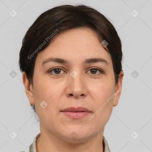 Joyful white adult female with short  brown hair and brown eyes