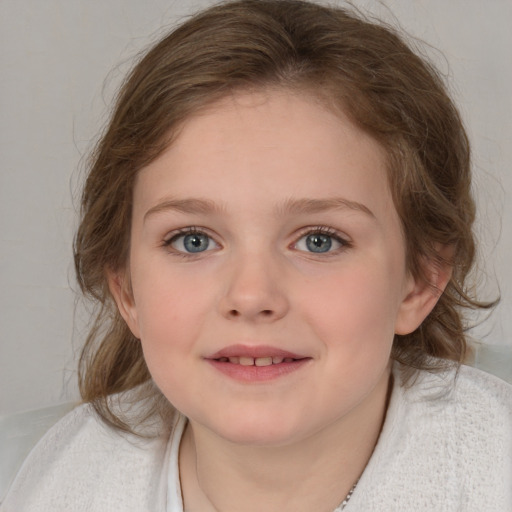 Joyful white child female with medium  brown hair and blue eyes