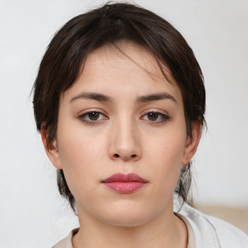 Neutral white young-adult female with medium  brown hair and brown eyes