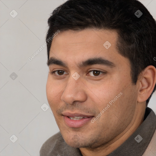 Joyful white young-adult male with short  black hair and brown eyes