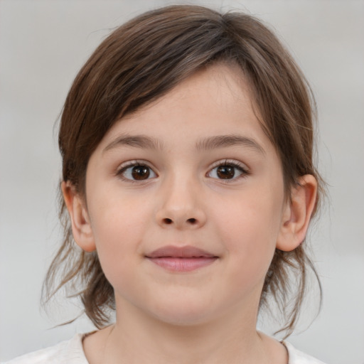 Joyful white child female with medium  brown hair and brown eyes