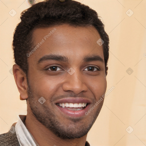 Joyful black young-adult male with short  brown hair and brown eyes