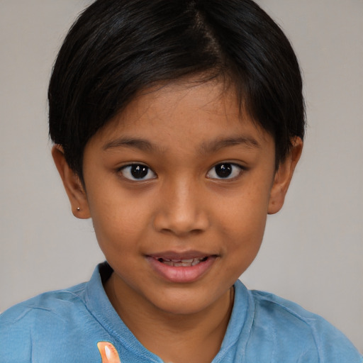 Joyful white child female with short  brown hair and brown eyes