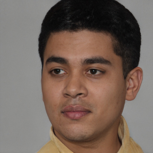 Neutral latino young-adult male with short  black hair and brown eyes