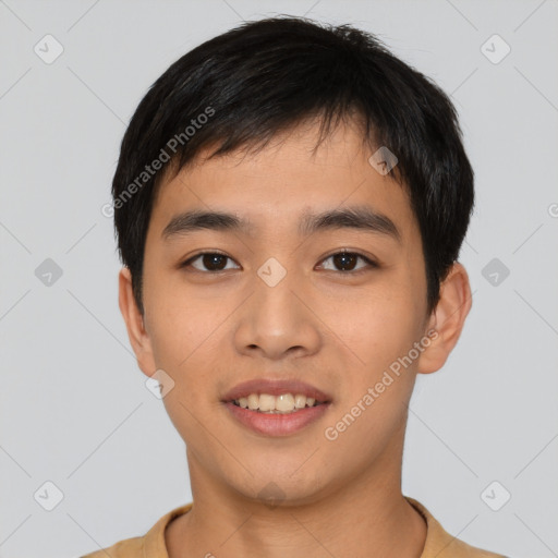 Joyful asian young-adult male with short  black hair and brown eyes