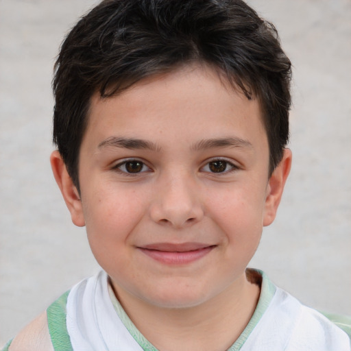 Joyful white child male with short  brown hair and brown eyes