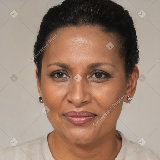 Joyful black adult female with short  brown hair and brown eyes