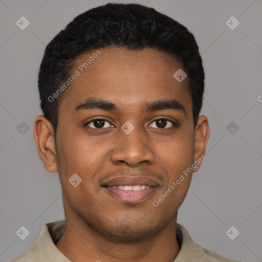 Joyful black young-adult male with short  black hair and brown eyes