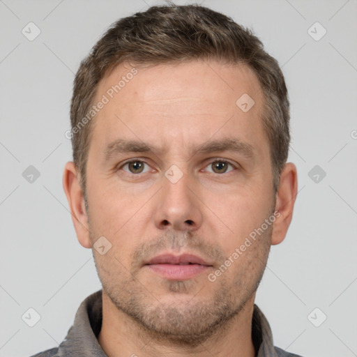 Neutral white adult male with short  brown hair and brown eyes