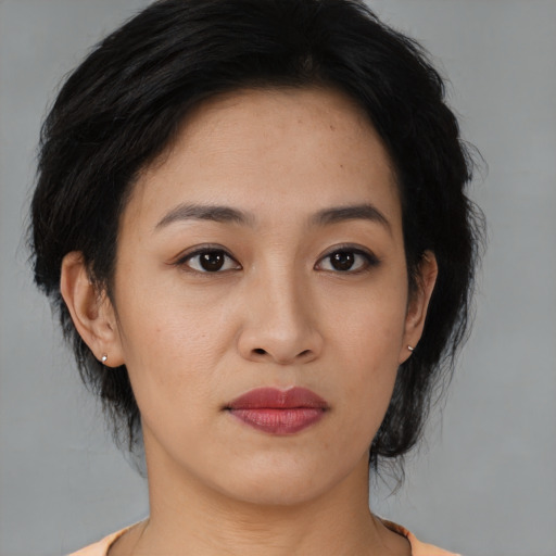 Neutral asian young-adult female with medium  black hair and brown eyes