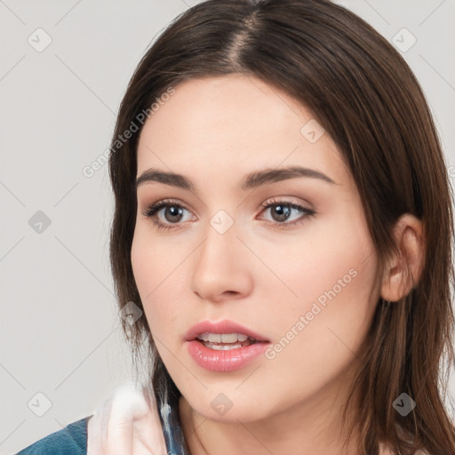 Neutral white young-adult female with long  brown hair and brown eyes