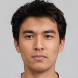 Neutral asian young-adult male with short  brown hair and brown eyes