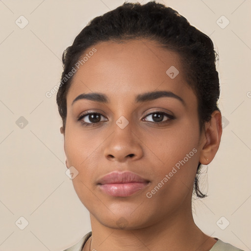 Neutral latino young-adult female with short  black hair and brown eyes