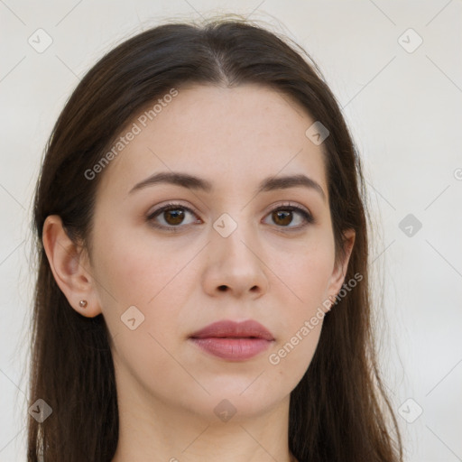 Neutral white young-adult female with long  brown hair and brown eyes