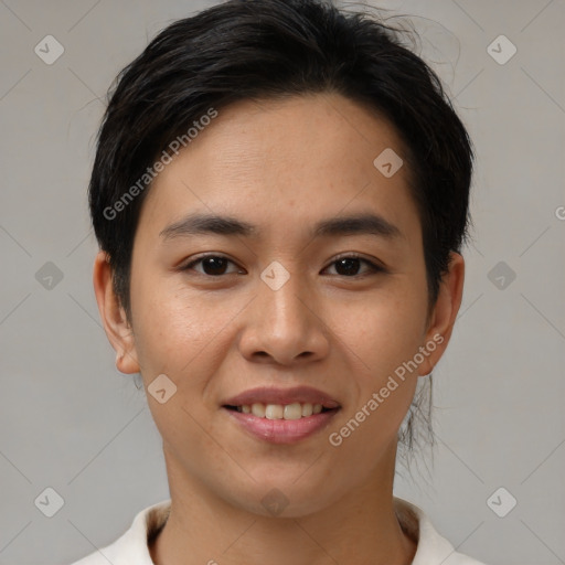 Joyful asian young-adult female with short  brown hair and brown eyes