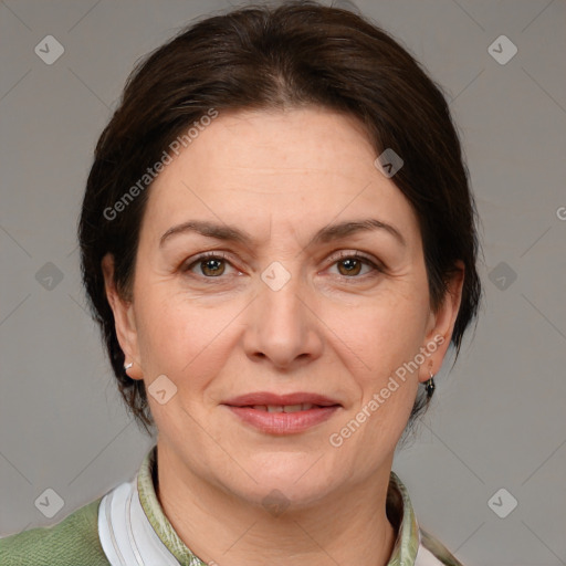 Joyful white adult female with medium  brown hair and grey eyes