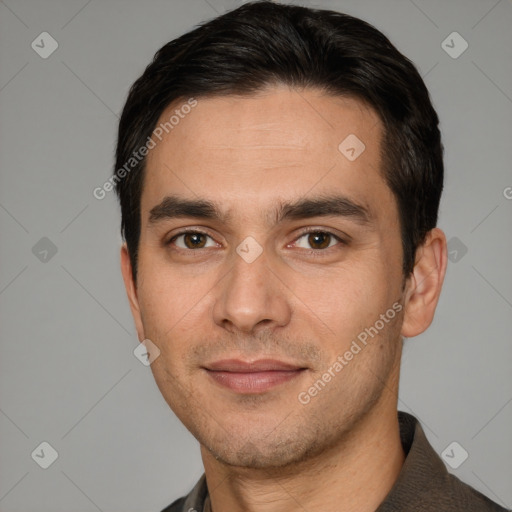 Joyful white young-adult male with short  brown hair and brown eyes