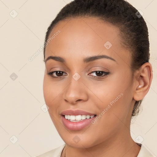 Joyful white young-adult female with long  brown hair and brown eyes