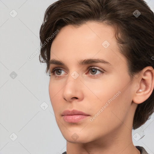 Neutral white young-adult female with short  brown hair and brown eyes