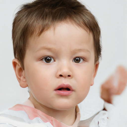 Neutral white child male with short  brown hair and brown eyes