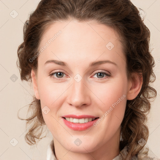 Joyful white young-adult female with medium  brown hair and green eyes