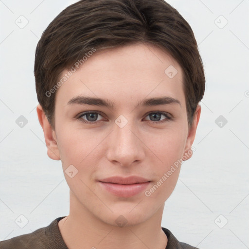 Joyful white young-adult female with short  brown hair and grey eyes