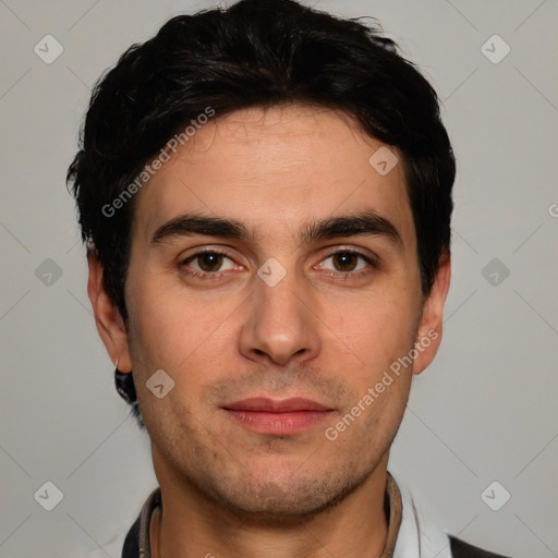 Joyful white young-adult male with short  black hair and brown eyes