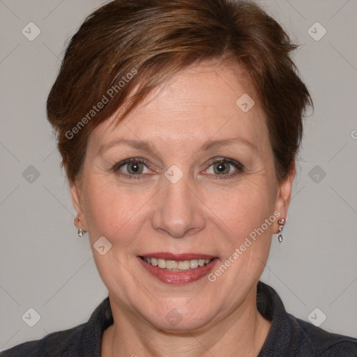 Joyful white adult female with medium  brown hair and blue eyes