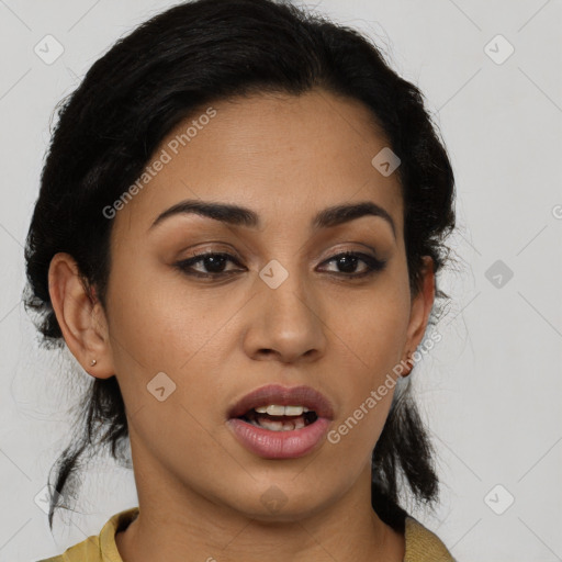 Joyful latino young-adult female with medium  brown hair and brown eyes