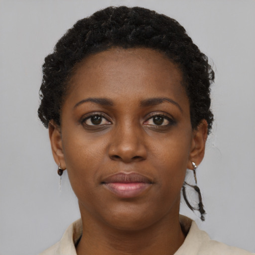 Neutral black young-adult female with short  black hair and brown eyes