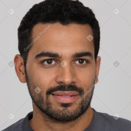 Joyful latino young-adult male with short  black hair and brown eyes