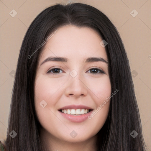 Joyful white young-adult female with long  black hair and brown eyes