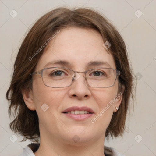 Joyful white adult female with medium  brown hair and grey eyes