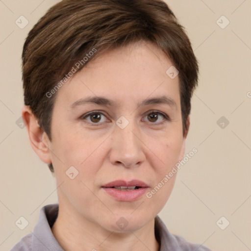 Joyful white adult female with short  brown hair and brown eyes