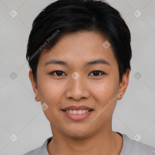 Joyful asian young-adult female with short  black hair and brown eyes