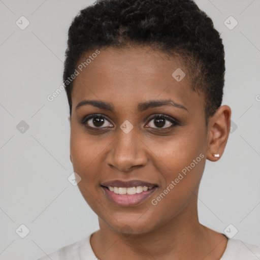 Joyful black young-adult female with short  brown hair and brown eyes