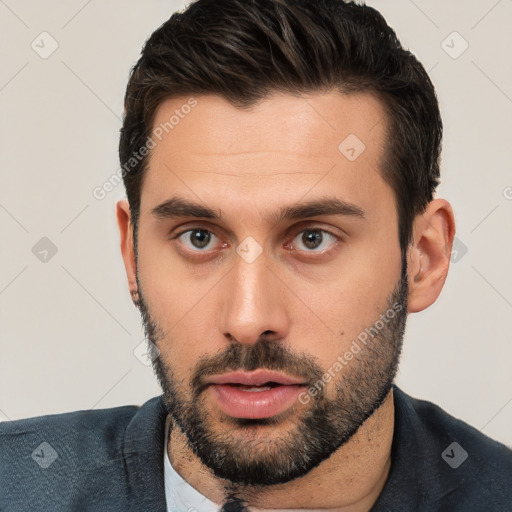 Neutral white young-adult male with short  brown hair and brown eyes