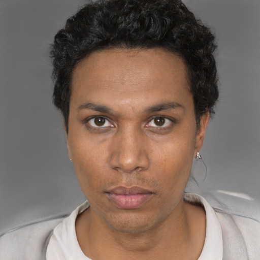 Neutral black adult male with short  black hair and brown eyes