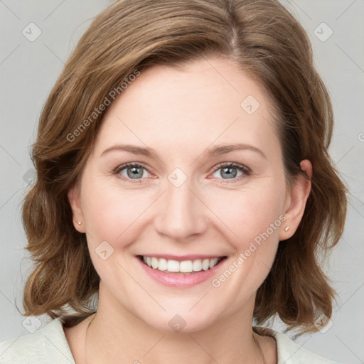 Joyful white young-adult female with medium  brown hair and blue eyes