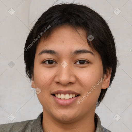 Joyful latino young-adult female with short  brown hair and brown eyes