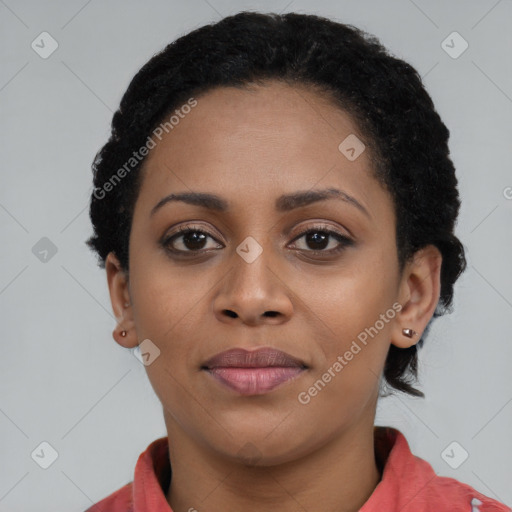 Joyful black young-adult female with short  black hair and brown eyes