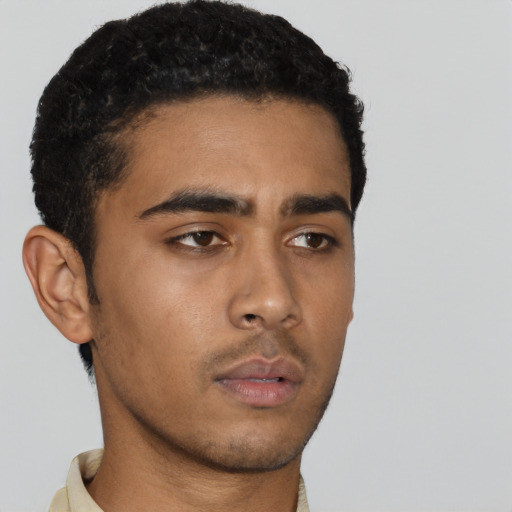 Neutral latino young-adult male with short  brown hair and brown eyes