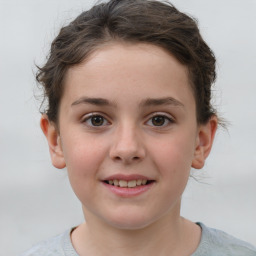 Joyful white child female with short  brown hair and brown eyes