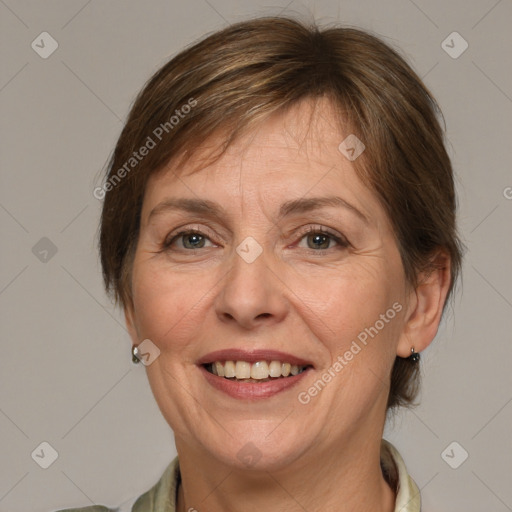 Joyful white adult female with medium  brown hair and grey eyes