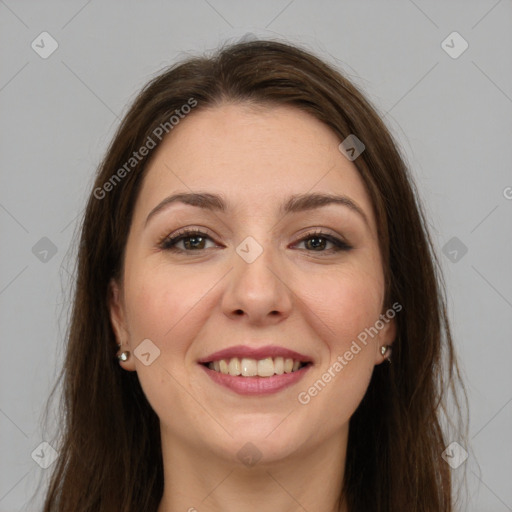 Joyful white young-adult female with long  brown hair and grey eyes