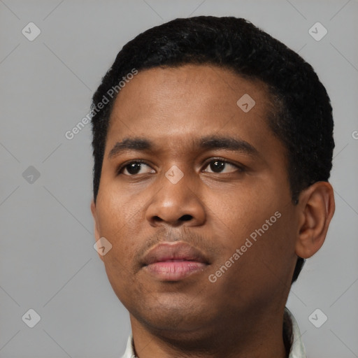 Neutral black young-adult male with short  black hair and brown eyes