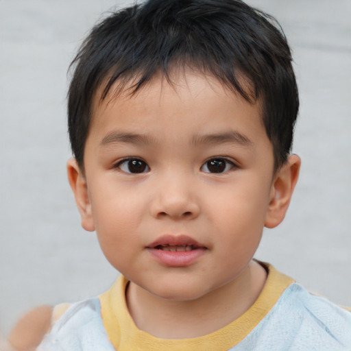 Neutral asian child male with short  brown hair and brown eyes