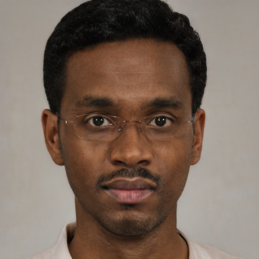Neutral black young-adult male with short  black hair and brown eyes