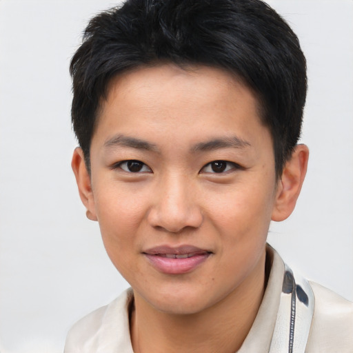Joyful asian young-adult male with short  brown hair and brown eyes