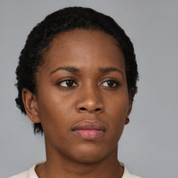 Neutral black young-adult female with short  brown hair and brown eyes